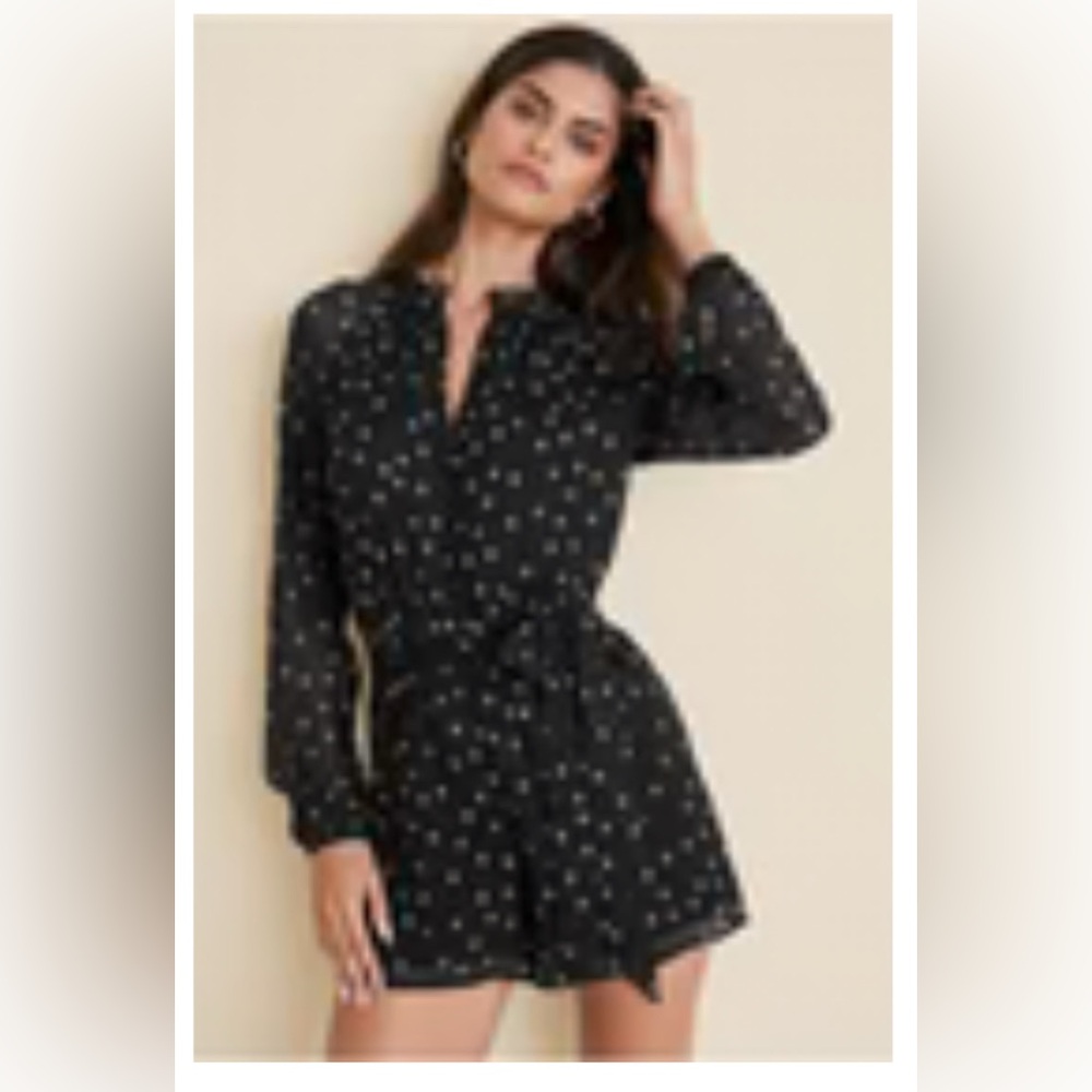 Black polkadot romper with mesh sleeves